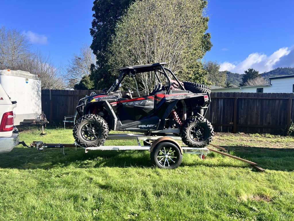 Side-by-side staged at the trailhead